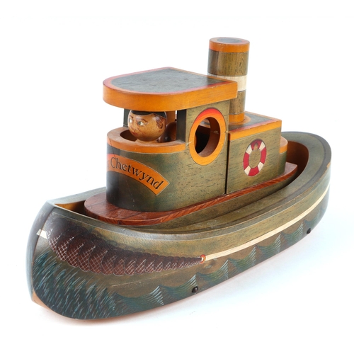 361 - Three carved and painted wooden toys to include a taxi, signed & dated 'Nic 86', 30cms, a racing car... 