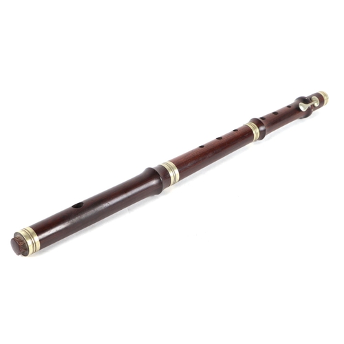 374 - A wooden six-hole single key flute, 50cms long.