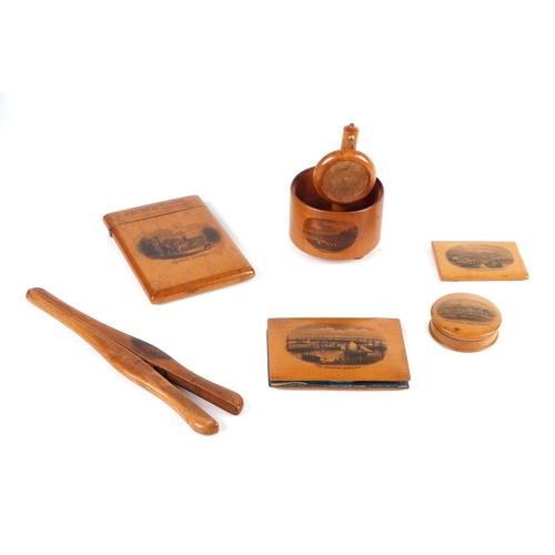 385 - A group of Victorian Mauchlinware to include a pocket watch stand, visiting card case and glove stre... 