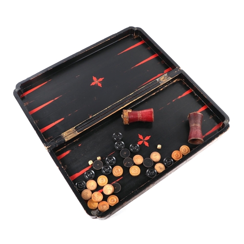 386 - A 19th century Chinese black lacquer backgammon board with chinoiserie decoration, 53cms wide; toget... 