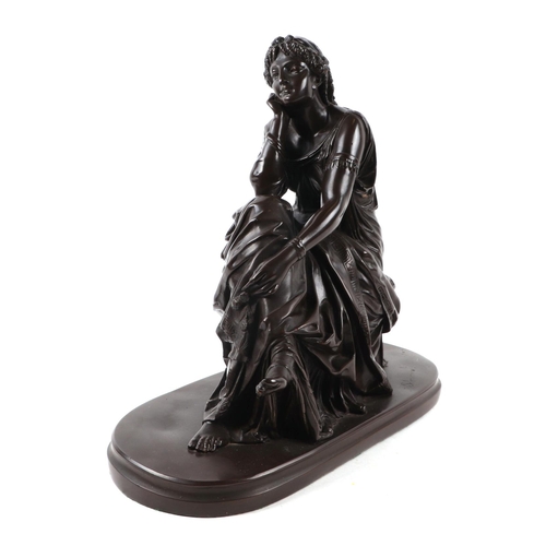 406 - A bronzed resin model of a seated Neoclassical female figure, 35cms wide.