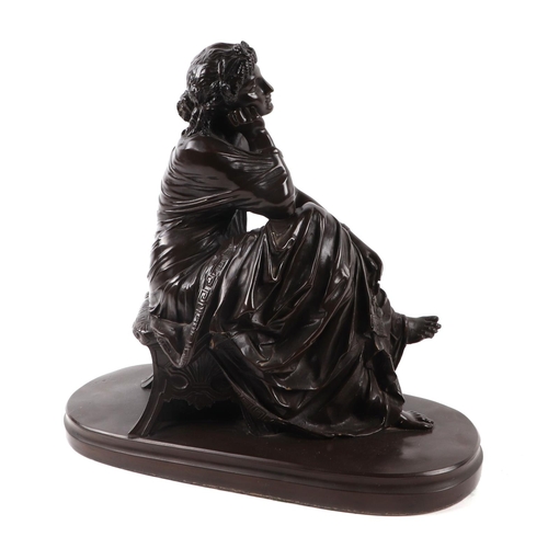 406 - A bronzed resin model of a seated Neoclassical female figure, 35cms wide.