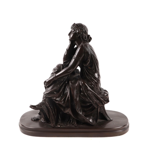 406 - A bronzed resin model of a seated Neoclassical female figure, 35cms wide.