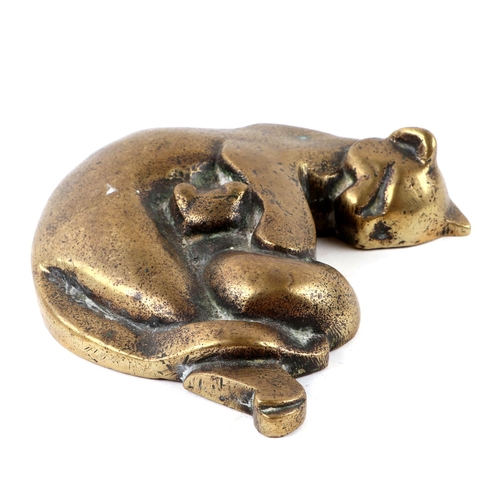 409 - A cast bronze group depicting a cat and kitten, 13cms wide.