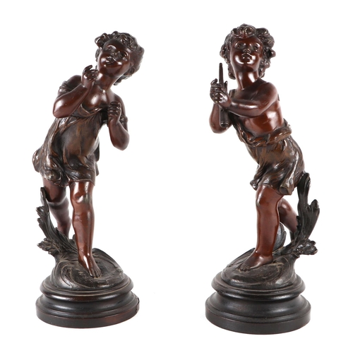 428 - A pair of Grand Tour style bronzed spelter figures, each approx 32cms high (2).