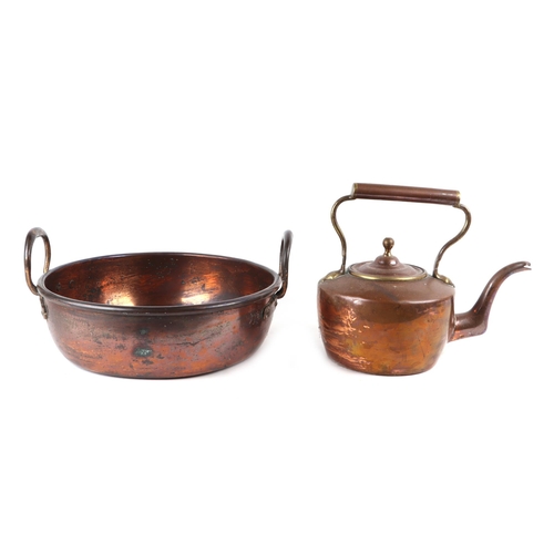 429 - A Victorian copper coal scuttle; together with a copper two-handled pan and a copper kettle (3).