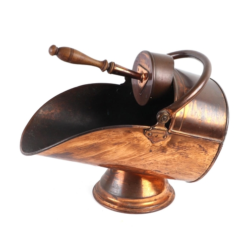 429 - A Victorian copper coal scuttle; together with a copper two-handled pan and a copper kettle (3).