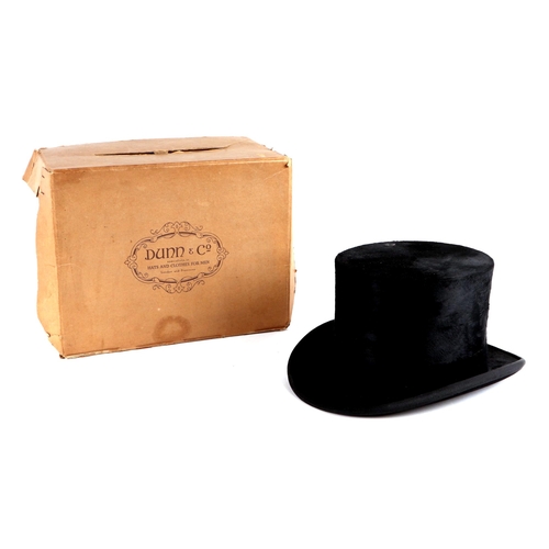 435 - A Dunn & Co. London moleskin top hat, approx 58.5cms diameter, in original cardboard box.