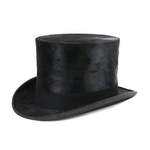 435 - A Dunn & Co. London moleskin top hat, approx 58.5cms diameter, in original cardboard box.