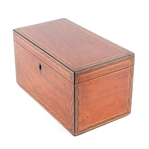 443 - A late 18th century mahogany tea caddy with marquetry inlaid decoration, 23cms wide.