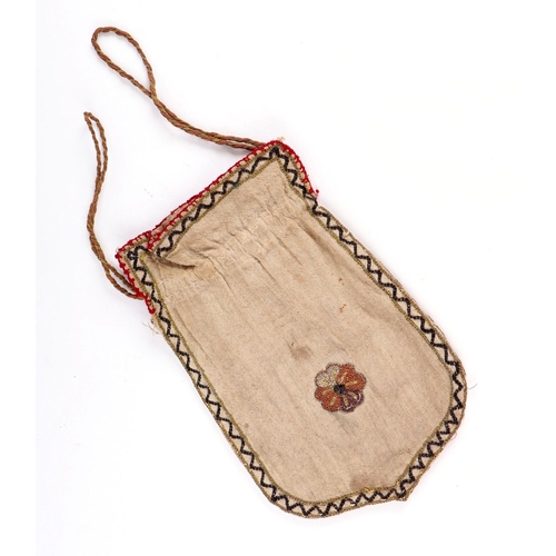 445 - A late 18th century ladies draw-string purse with embroidered floral decoration.