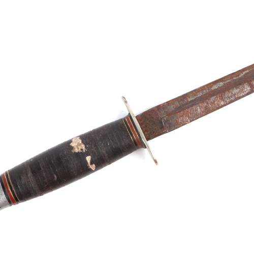 46 - A William Rogers fighting knife with leather sheath, 26cms long.