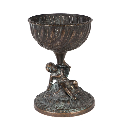 468 - A Grand Tour style bronze bowl on stand with a cast cherub holding the bowl aloft, 21cms high.Condit... 