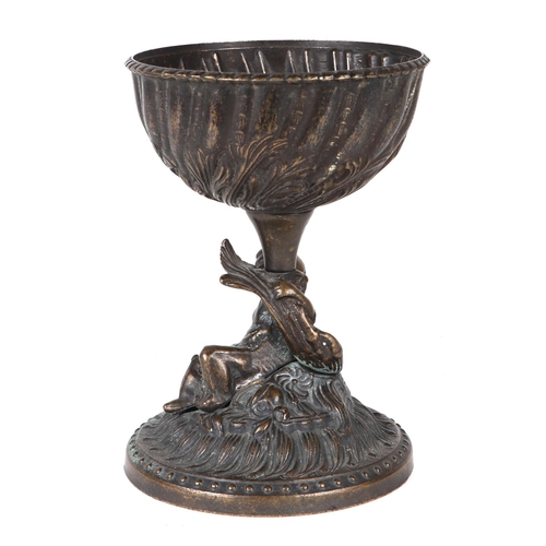 468 - A Grand Tour style bronze bowl on stand with a cast cherub holding the bowl aloft, 21cms high.Condit... 