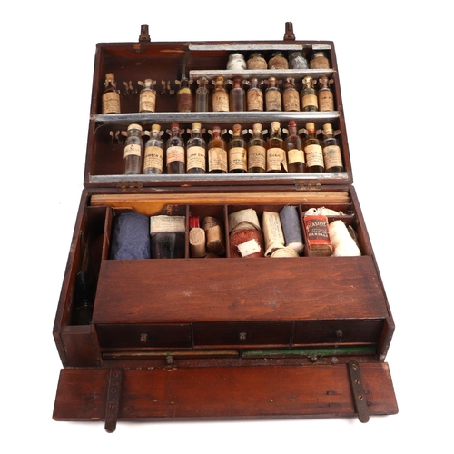 470 - A vintage travelling veterinarian's case with fitted interior containing various apothecary bottles ... 