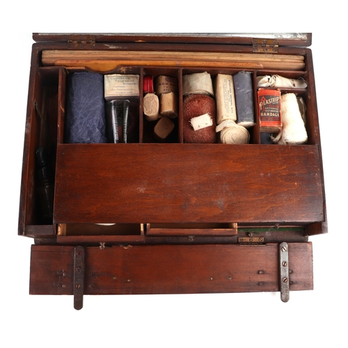 470 - A vintage travelling veterinarian's case with fitted interior containing various apothecary bottles ... 