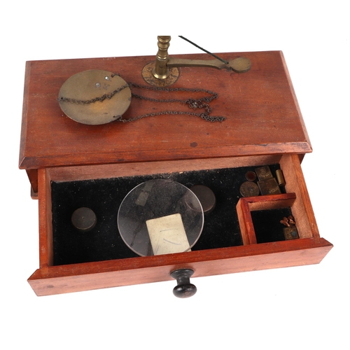 471 - A pair of late 19th century brass and mahogany apothecary scales.