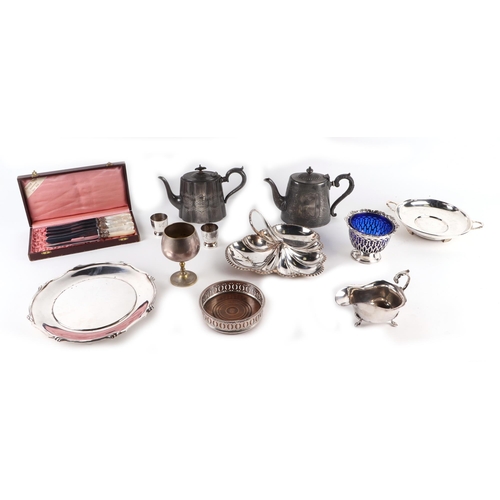 519 - A large quantity of silver plated items to include a wine coaster, bowls, dishes and flatware.