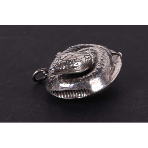 527 - A 925 silver vesta case in the form of a coiled snake, 4.5cms wide, 23g.