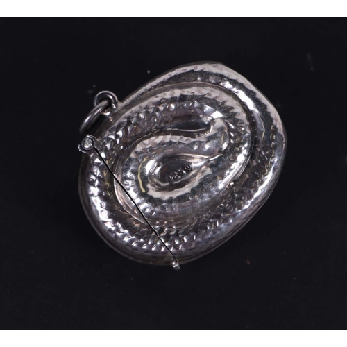 527 - A 925 silver vesta case in the form of a coiled snake, 4.5cms wide, 23g.