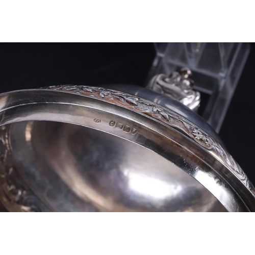 539 - A large heavy 18th century Irish silver twin-handled trophy cup with 'S' scroll handles, repousse fo... 