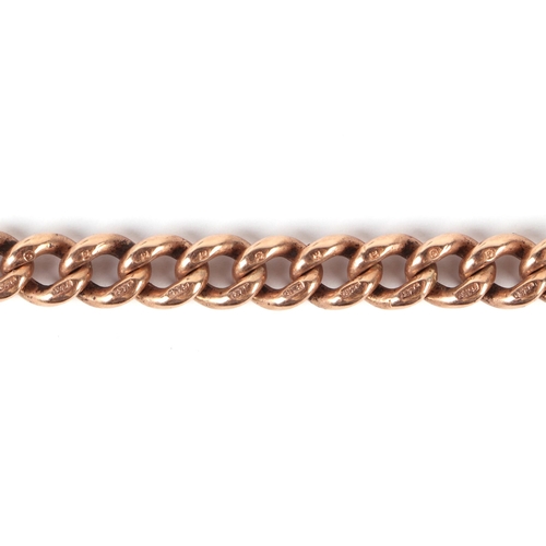 555 - A 9ct rose gold pocket watch chain with 'T' bar, 43cms long, 56.2g.