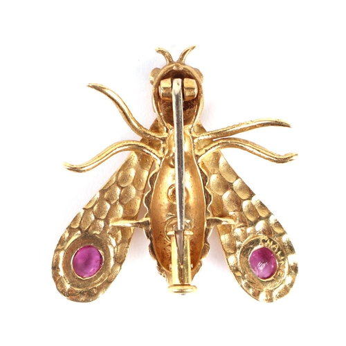 562 - An 18ct gold bee brooch by Chaumet (France), circa 1970, the body set with four diamonds, the wings ... 