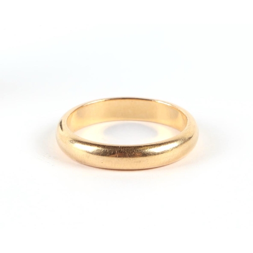 566 - An 18ct gold wedding band, approx UK size P, 5.6g.