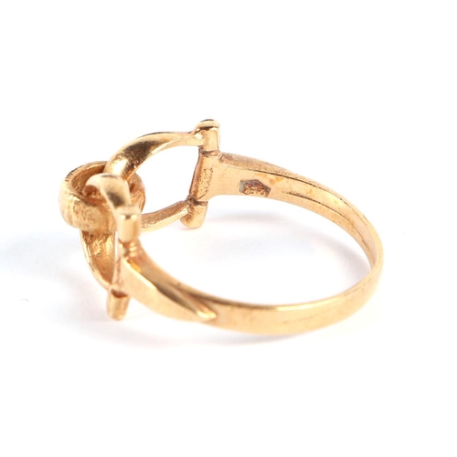 568 - Equestrian interest.  An 18ct gold stirrup ring, approx UK size N, 3.3g.