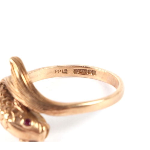 571 - A 9ct gold ring in the form of a koi carp with ruby set eyes, maker's mark PPld, approx UK size T, 4... 