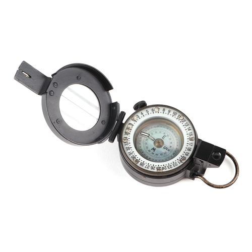 58 - A Hilgar & Watts field compass in a black lacquer case, 6cms diameter.