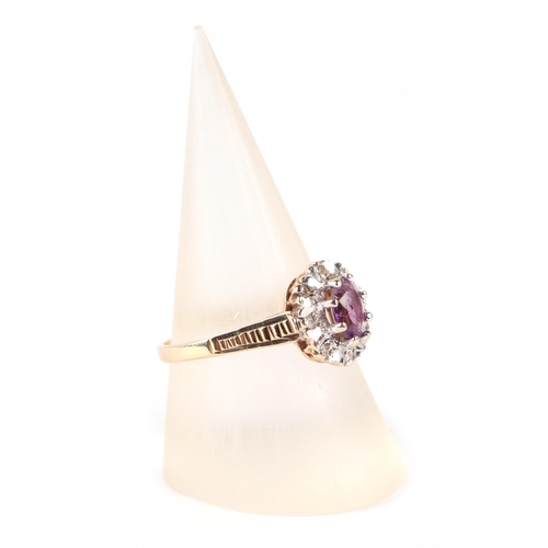 605 - A 9ct gold amethyst and diamond cluster ring, approx UK size M, 1.9g.