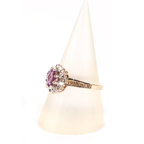 605 - A 9ct gold amethyst and diamond cluster ring, approx UK size M, 1.9g.