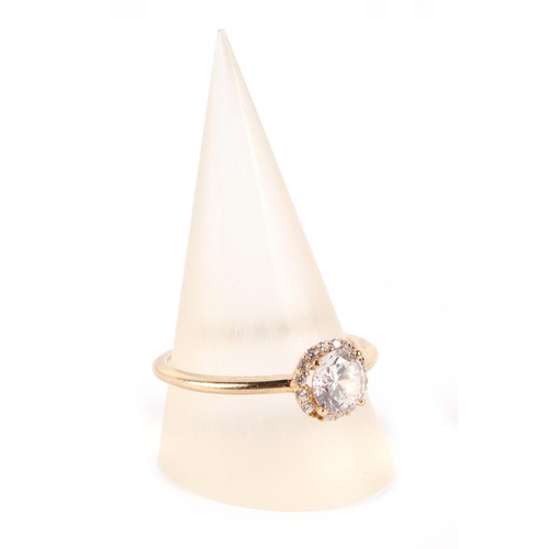 608 - A 9ct gold white stone cluster ring, approx UK size R, 2.3g.