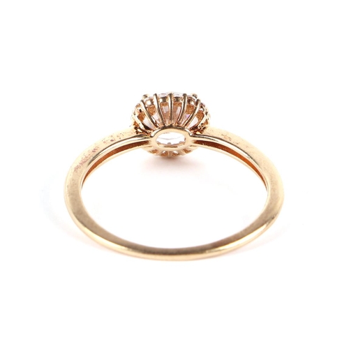 608 - A 9ct gold white stone cluster ring, approx UK size R, 2.3g.