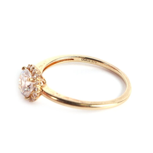 608 - A 9ct gold white stone cluster ring, approx UK size R, 2.3g.