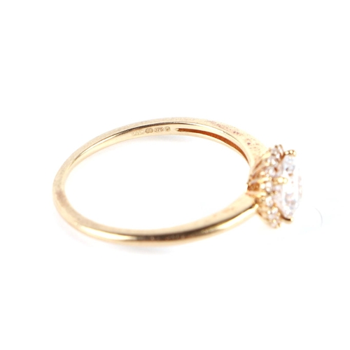 608 - A 9ct gold white stone cluster ring, approx UK size R, 2.3g.