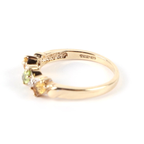 612 - A 9ct gold peridot, citrine and diamond ring, approx UK size N, 2.6g.