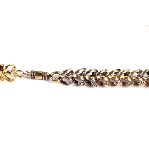 618 - A Victorian unmarked yellow metal fancy link necklace, 75cms long, 53.6g.