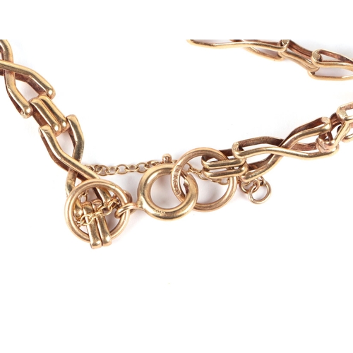 634 - A 9ct gold bracelet; together with a 9ct gold wishbone ring; a 9ct gold cross pendant; fine gold cha... 