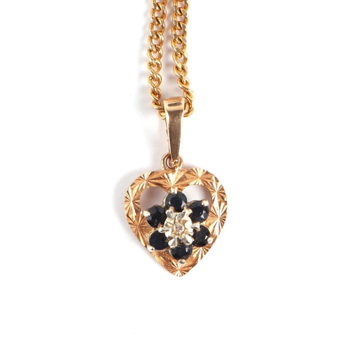 639 - A 9ct gold diamond and sapphire pendant on a fine gold chain, 4g.