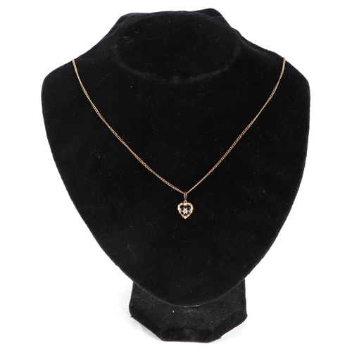 639 - A 9ct gold diamond and sapphire pendant on a fine gold chain, 4g.