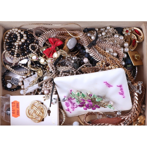 641 - A quantity of costume jewellery to include a rolled gold bangle; necklaces and brooches.