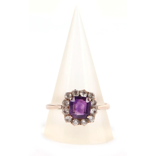 648 - A 9ct gold amethyst and white stone cluster ring, approx. UK size T, 3.5g.