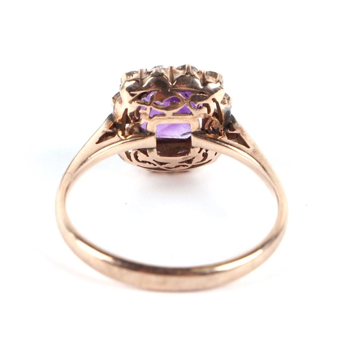 648 - A 9ct gold amethyst and white stone cluster ring, approx. UK size T, 3.5g.