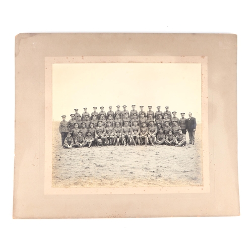 65 - Three early 20th century Dorset Regimental photographs, each 29 by 21cms, all mounted but unframed (... 