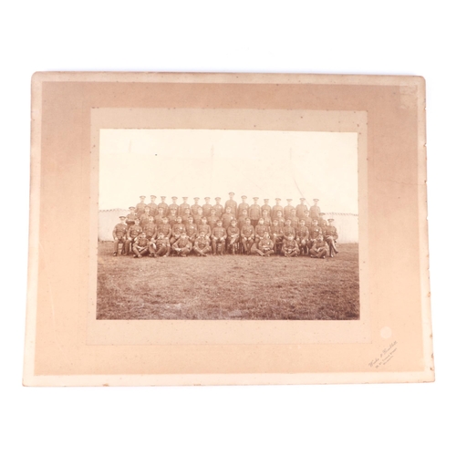 65 - Three early 20th century Dorset Regimental photographs, each 29 by 21cms, all mounted but unframed (... 