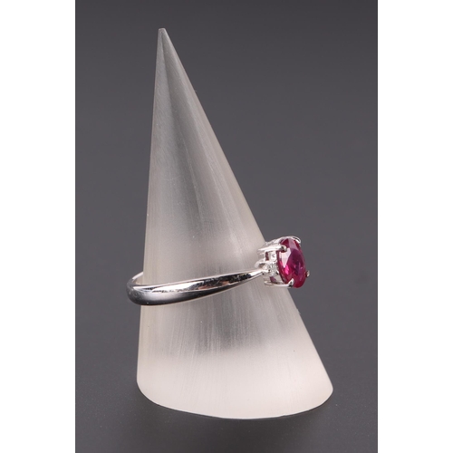 651 - A 14ct white gold ruby and diamond ring, approx UK size N, 2.3g.Condition ReportRuby looks to be syn... 