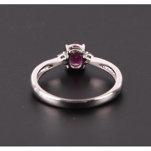 651 - A 14ct white gold ruby and diamond ring, approx UK size N, 2.3g.Condition ReportRuby looks to be syn... 