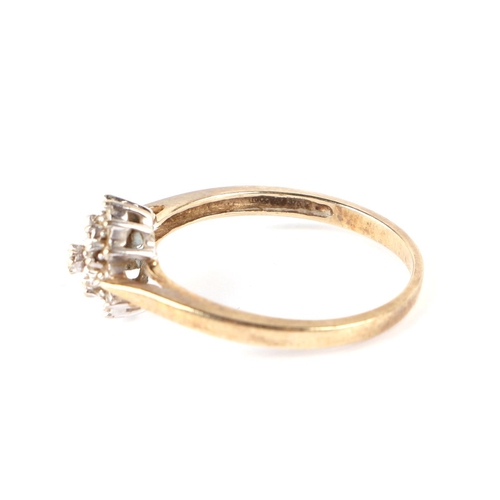 656 - A 9ct gold diamond cluster ring, approx UK size, P, 2g.